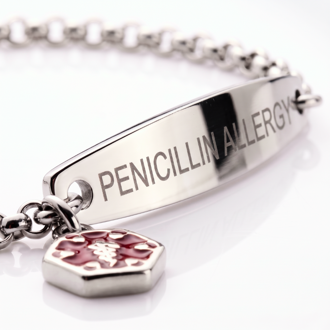 Close-up of the PENICILLIN ALLERGY plate on the silver bracelet